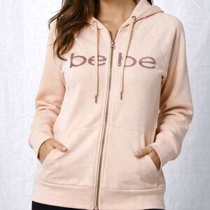 bebe Women’s Blush Hooded Zip-Up Jacket | Glitzy Logo Sparkle | Size M